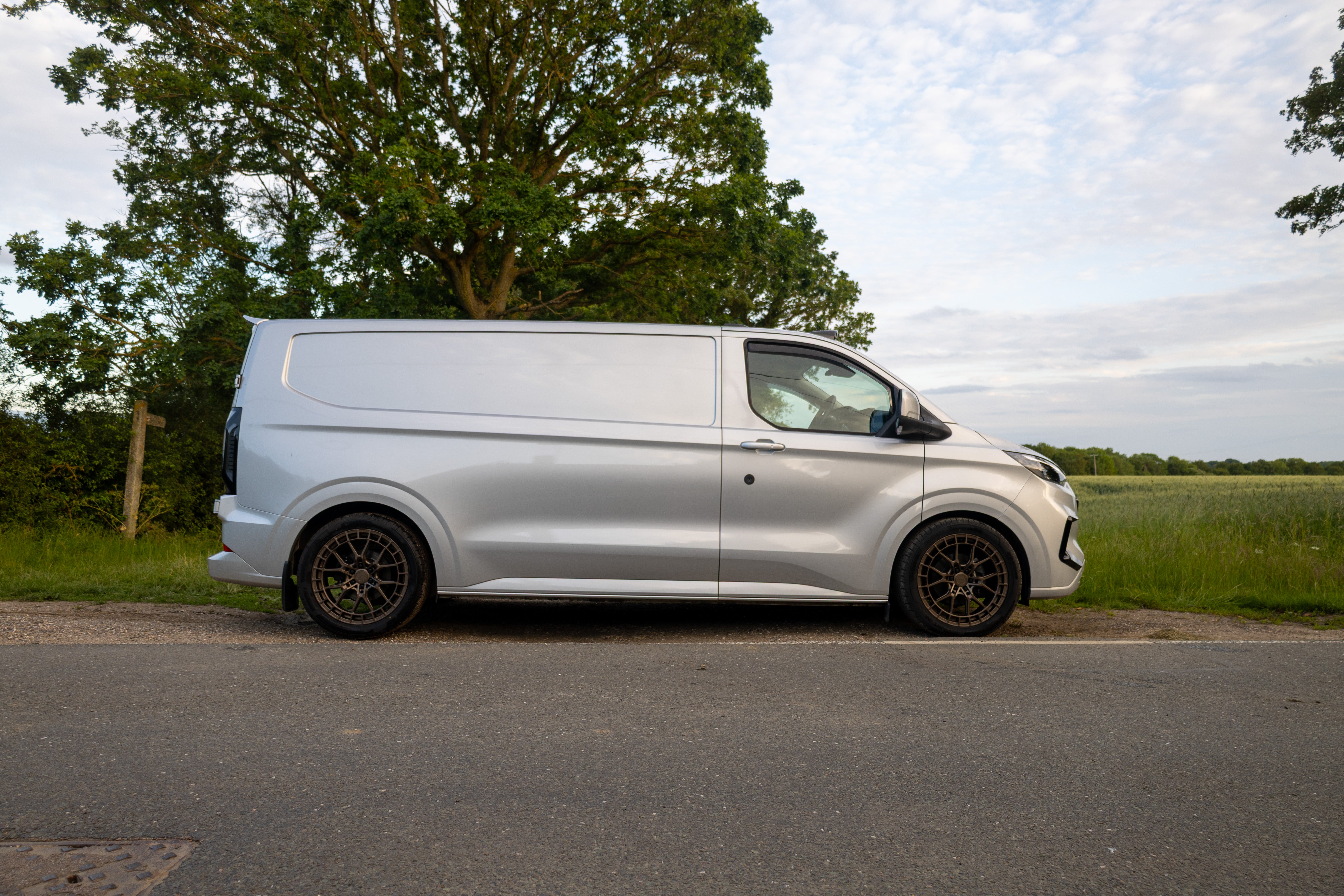 Ford Transit Custom Mk2 side profile fitted with Riviera RF26 Matt Bronze alloy wheels